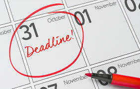 A date on a paper calendar is circled with red pen and has the word "Deadline!" written on it